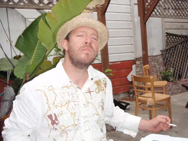 Courtroom debate over Arundhati Roy's smoking image on cover of newly released book's cover stirs...